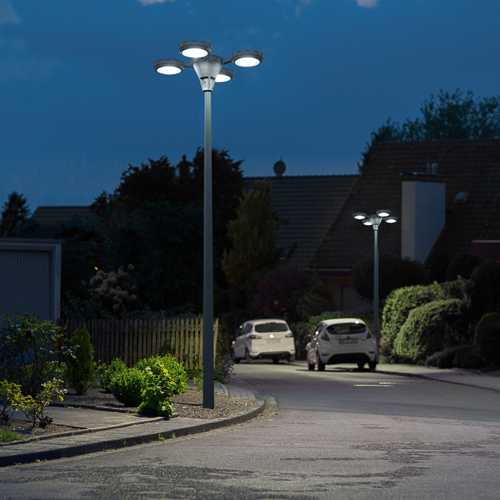 Outdoor lighting along a residential community road at night